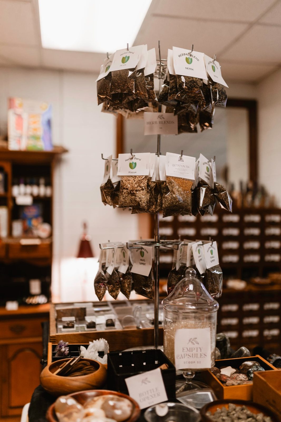 Bundles of dried herbs hanging near the front window